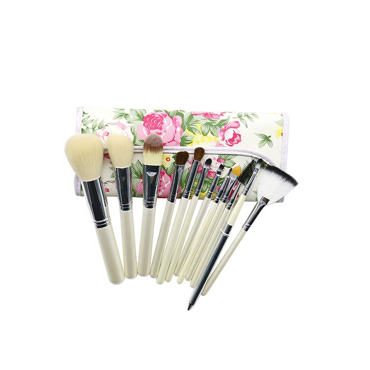 Most attractive wooden handle synthetic hair material makeup brush set with printed pouch